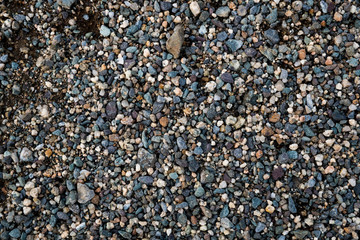 The texture of a shallow river stone. Pebble Background Image