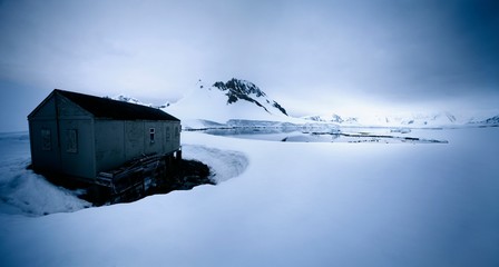 Shack in Winter Landscape