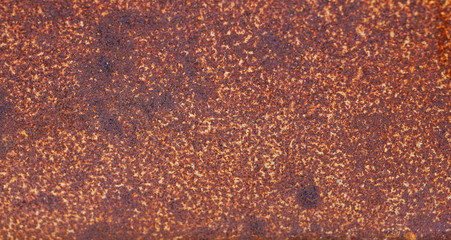 Rusted white painted metal wall. Rusty metal background with streaks of rust. 