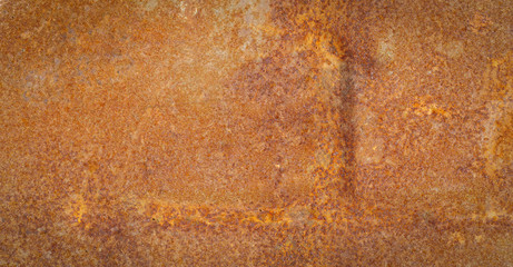 Rusted white painted metal wall. Rusty metal background with streaks of rust. 