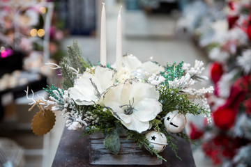 Christmas decorations on the Christmas tree. Christmas flower composition. 