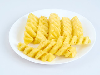 Pineapple slices in white plate