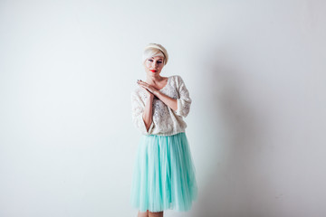 beautiful blonde woman in green dress and take