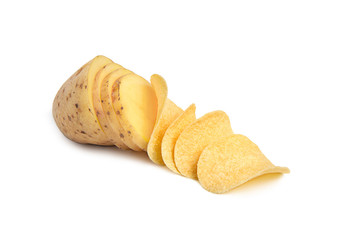 Creative photography. Sliced potatoes and chips on a white isolated background. The idea is how...