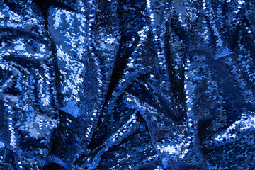 Blue festive shiny background with place for festive inscription.