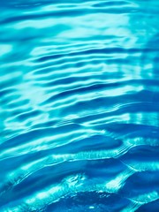 Small waves of blue water