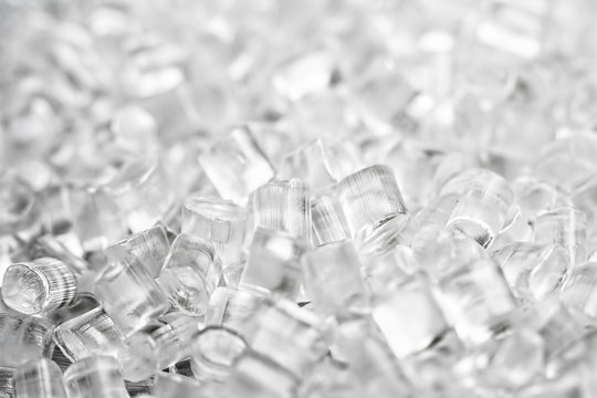 Background of plastic granules. Abstract background of artificial diamonds.