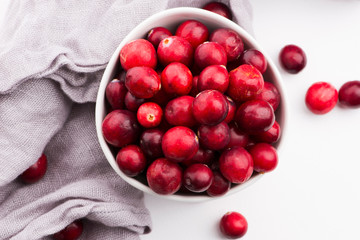 Ceramic bowl of Cranberry on white background