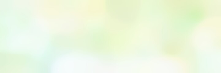 soft blurred horizontal background with beige, honeydew and tea green colors and free text space