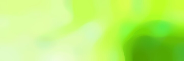 blurred bokeh horizontal background with green yellow, tea green and dark green colors and free text space