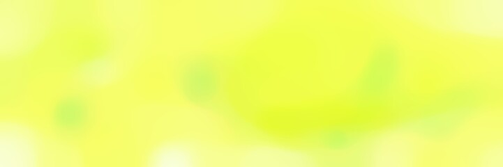 blurred bokeh horizontal background with khaki, pastel yellow and green yellow colors and space for text
