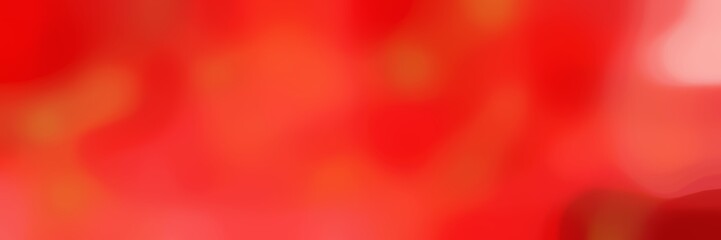 blurred horizontal background with crimson, orange red and tomato colors and space for text or image