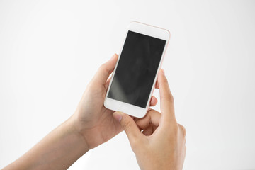 Fototapeta na wymiar Person holding smartphone with blank white screen. Mobile app mockup.