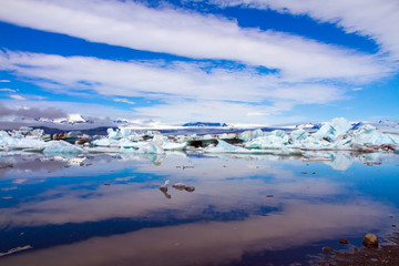 White and blue icebergs and ice floes