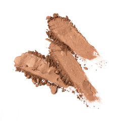Smear of shiny brown eyeshadow isolated on white