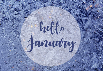 Hello January.Abstract blurred frosty natural pattern on the window glass.