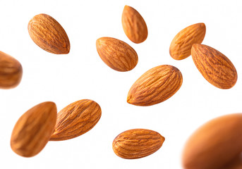 almond pieces flying  Shallow depth of field .nuts concept
