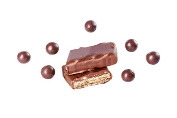 melted chocolate fly pieces with chocolate ball isolated on white