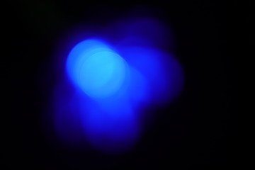 Christmas blurred blue light Snowflake bokeh with black background