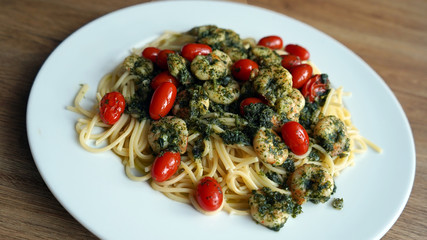 healthy meal - spaghetti, cherry tomatoes and shrimp