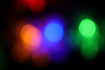 Christmas blurred colorful snowflake bokeh with black background