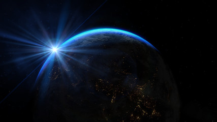 Fototapeta na wymiar Planet earth from the space at night. Sunrise illuminate the earth in outer space.