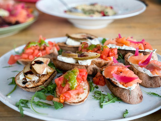 variety plate of bruschetta with fresh ingredients