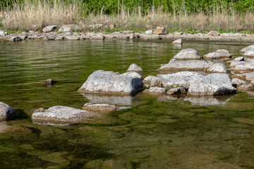 stones in lake water