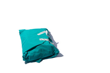 The interior of this green fabric contains tools for sterile dressing.
