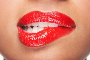 Fotobehang Woman Biting Red Lips © moodboard