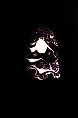 abstraction in the form of an image on an isolated black background macro photography,