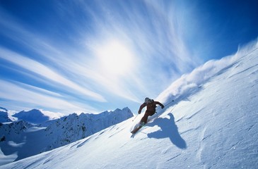 Skier Skiing On Mountain Slope - obrazy, fototapety, plakaty