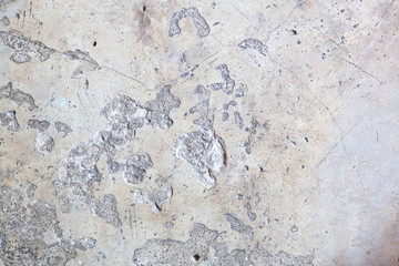 A polished cement floor and have cracks and unevenness.