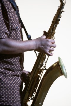 Closeup Side View Midsection Of Man With Saxophone