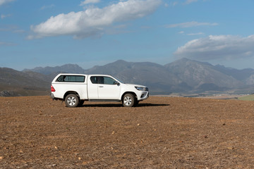 Fototapeta na wymiar Caledon, Wesstern Cape, South Africa. December 2019. White coloured farm vehicle