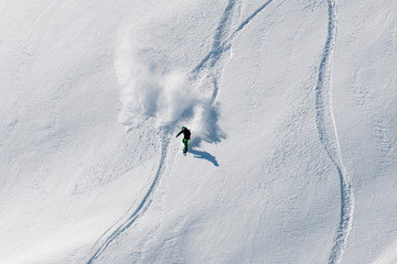 Freerider snow trails in the new powder