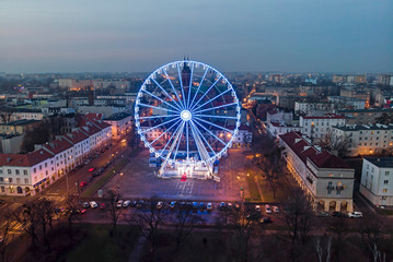 Ferris wheel at the Old Market in the city of Lodz, Poland. - obrazy, fototapety, plakaty