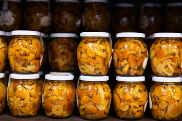 Glass jars of marinated chanterelles © JackF