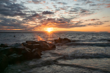 romantic seashore sunset with dramatic sky