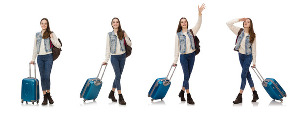 Smiling caucasian girl walking with suitcase isolated on white