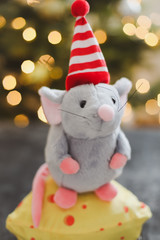 Little mouse toy, symbol of 2020. new year decoration. New Year 2020 Symbol. Greeting Christmas card.  Selective focus.