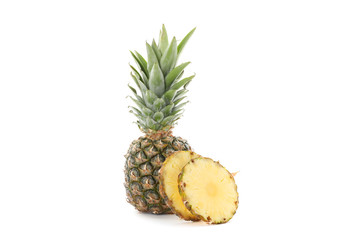 Pineapple and slices isolated on white background
