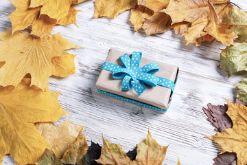 Flat lay autumn composition with gift box