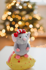 Little mouse toy, symbol of 2020. new year decoration. New Year 2020 Symbol. Greeting Christmas card.  Selective focus.