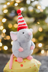 Little mouse toy, symbol of 2020. new year decoration. New Year 2020 Symbol. Greeting Christmas card.  Selective focus.
