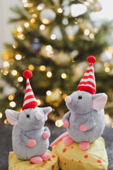 Little mouse toy, symbol of 2020. new year decoration. New Year 2020 Symbol. Greeting Christmas card.  Selective focus.