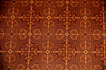 brown texture with crosses and geometric shapes