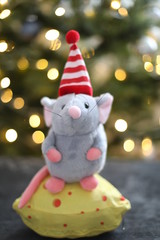 Little mouse toy, symbol of 2020. new year decoration. New Year 2020 Symbol. Greeting Christmas card.  Selective focus.