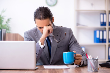 Unhappy male businessman in the office