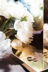 Wedding bouquet and the gold ring